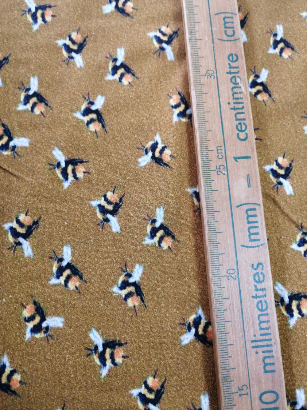 Bees on Mustard cotton jersey fabric by the half metre - Image 2