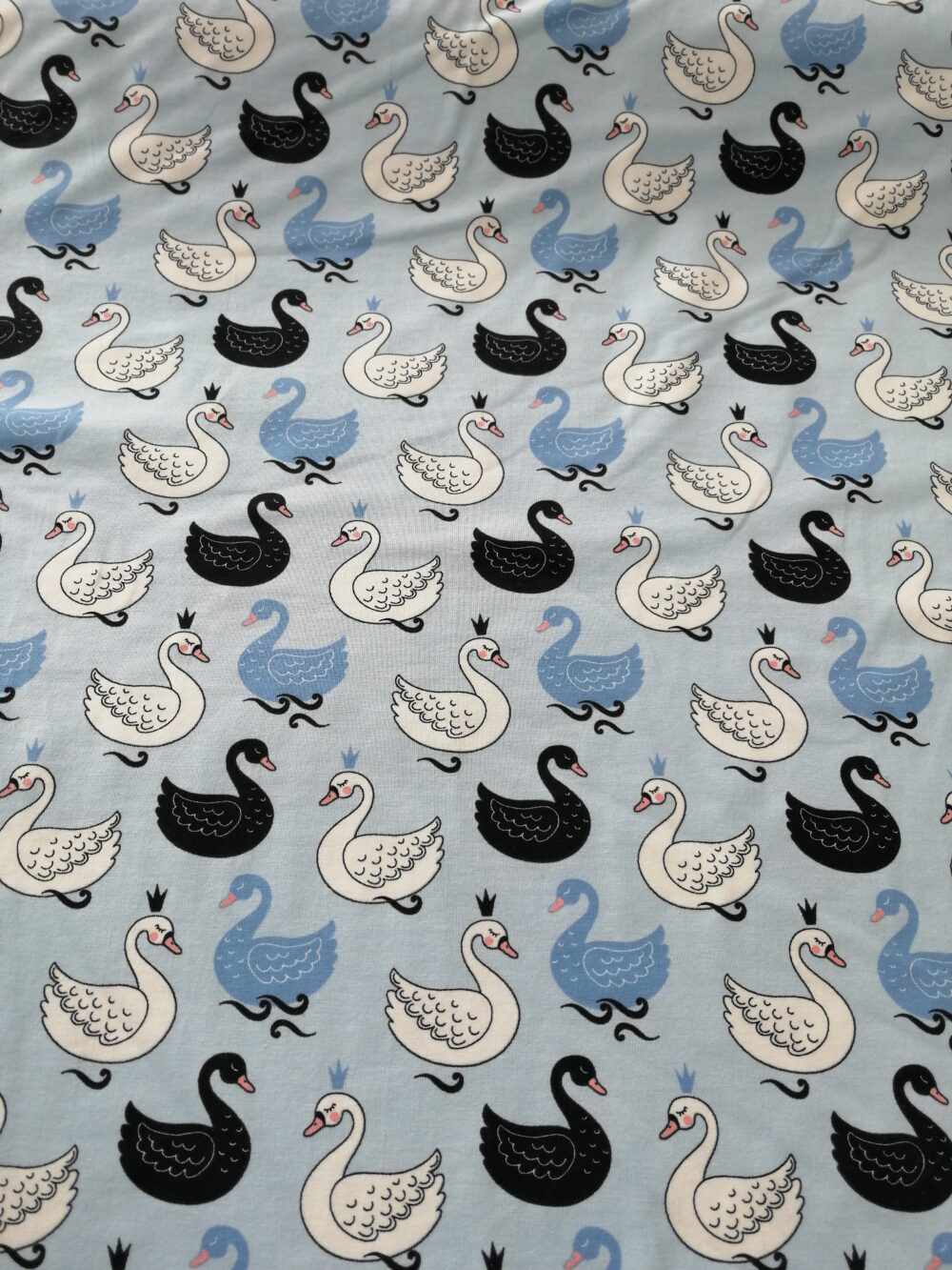 Blue and white swan cotton jersey fabric by the half metre