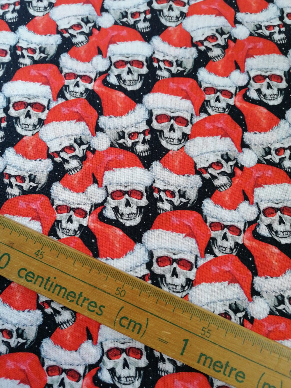 Skulls with Santa hats cotton fabric by the half metre - Image 2