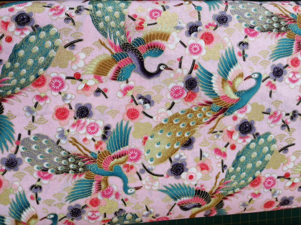 Peacocks on pink japanese cotton fabric