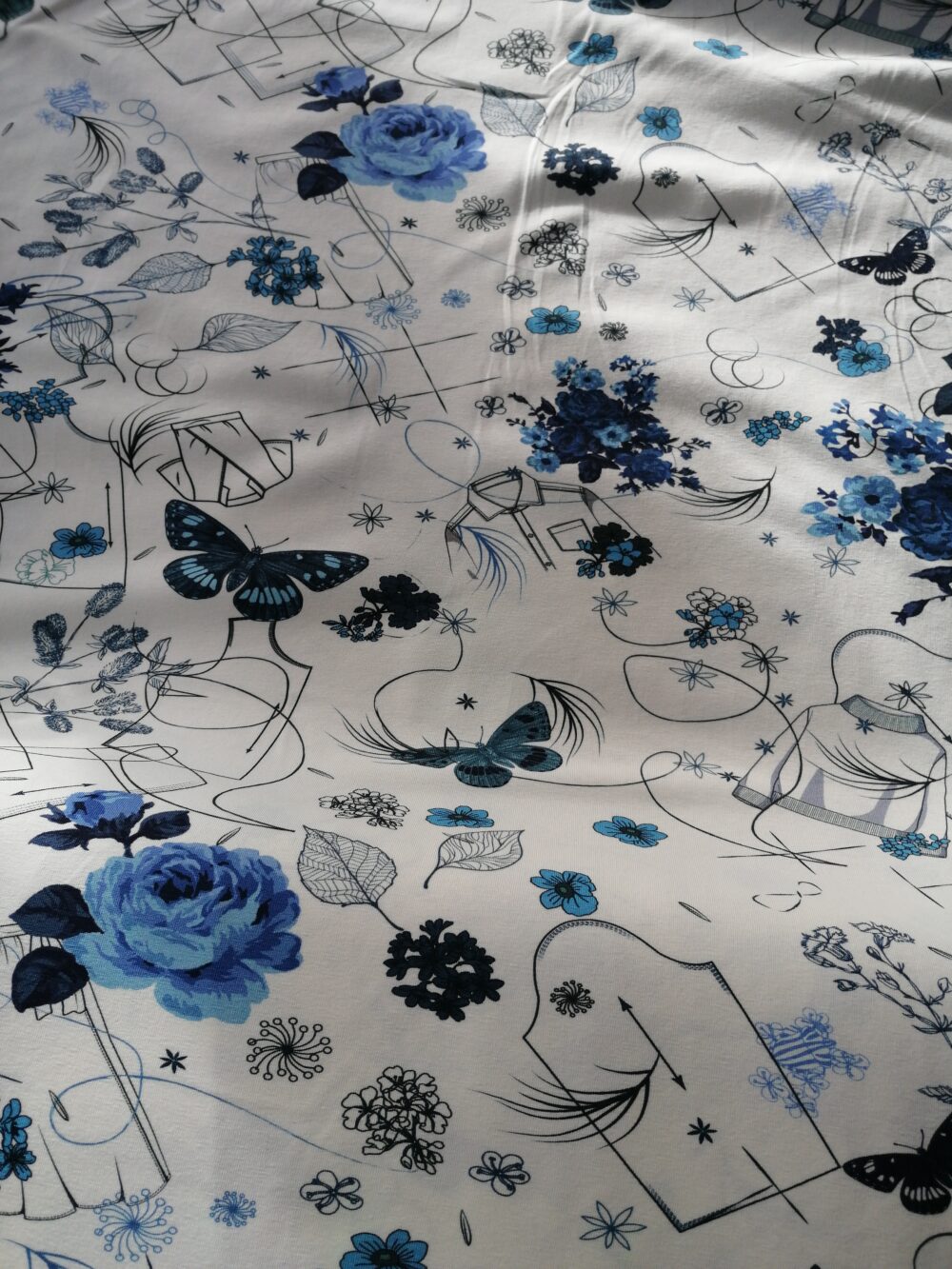 Blue floral and pattern pieces cotton jersey fabric