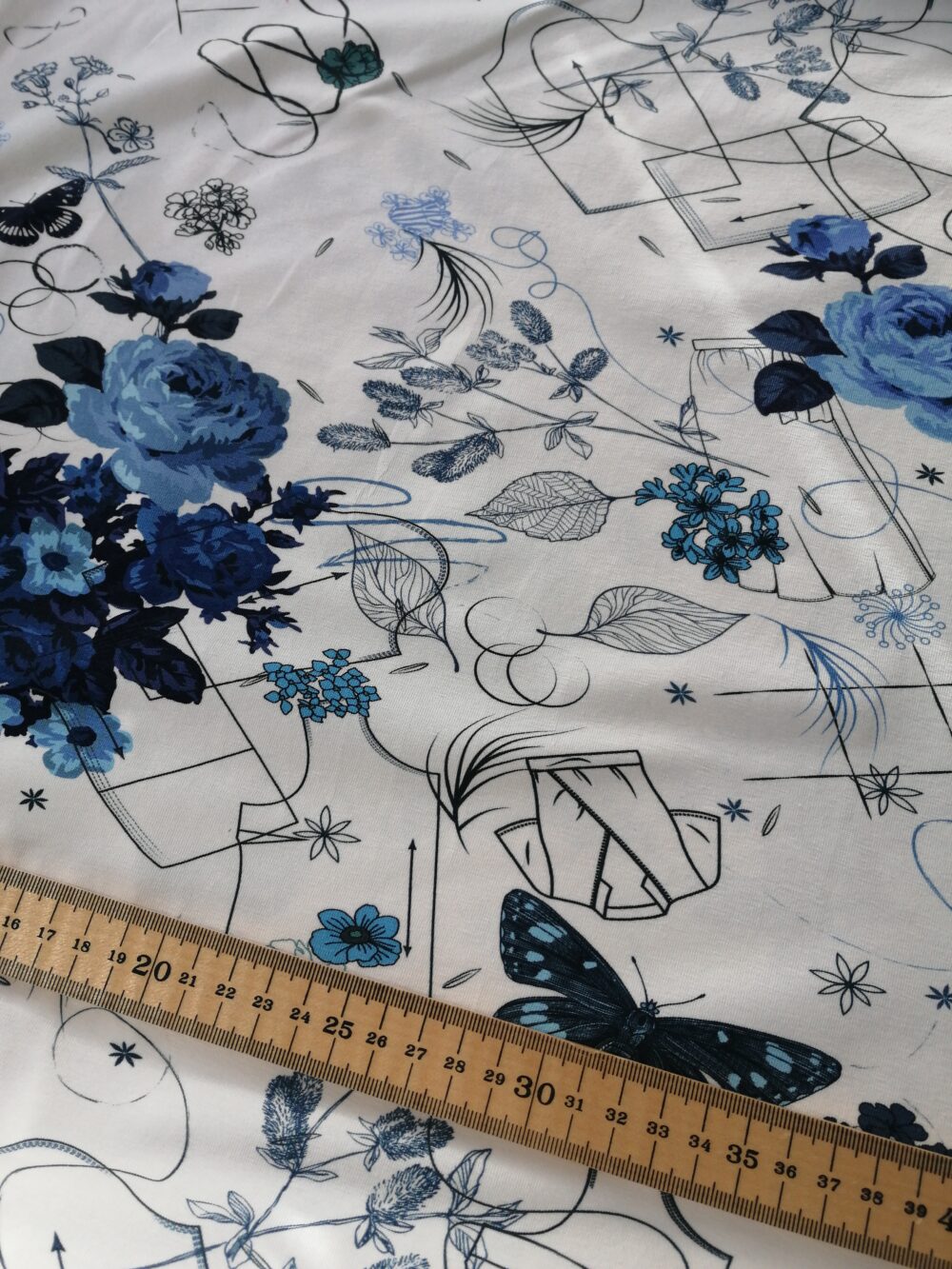 Blue floral and pattern pieces cotton jersey fabric - Image 3